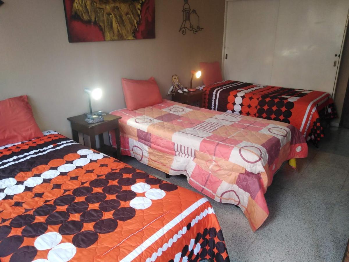 Cama individual en habitación compartida mixta