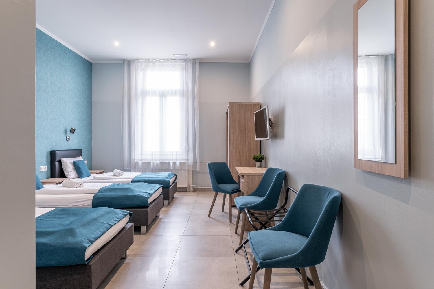 Habitación Doble con cama supletoria (3 adultos)