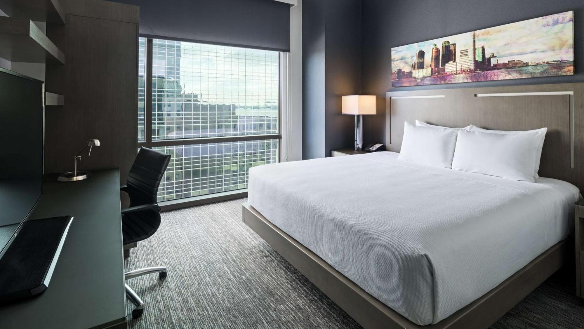 Kamer met Kingsize Bed en Uitzicht op de Stad