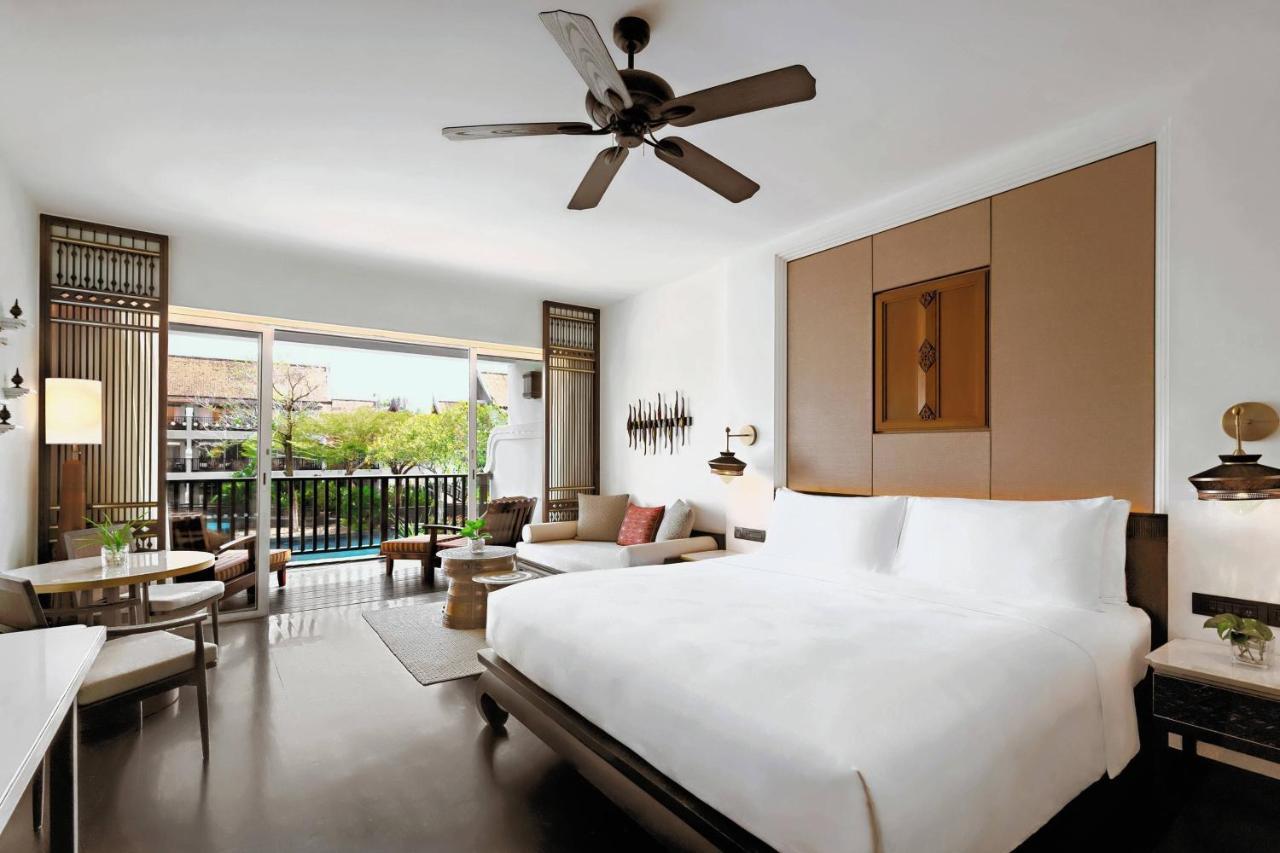Deluxe King Room Sofa Bed Pool View