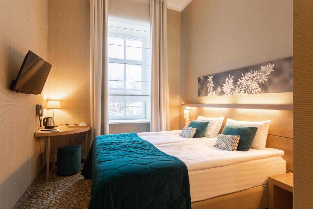 Quarto Clássico com Cama de Casal ou 2 de Solteiro