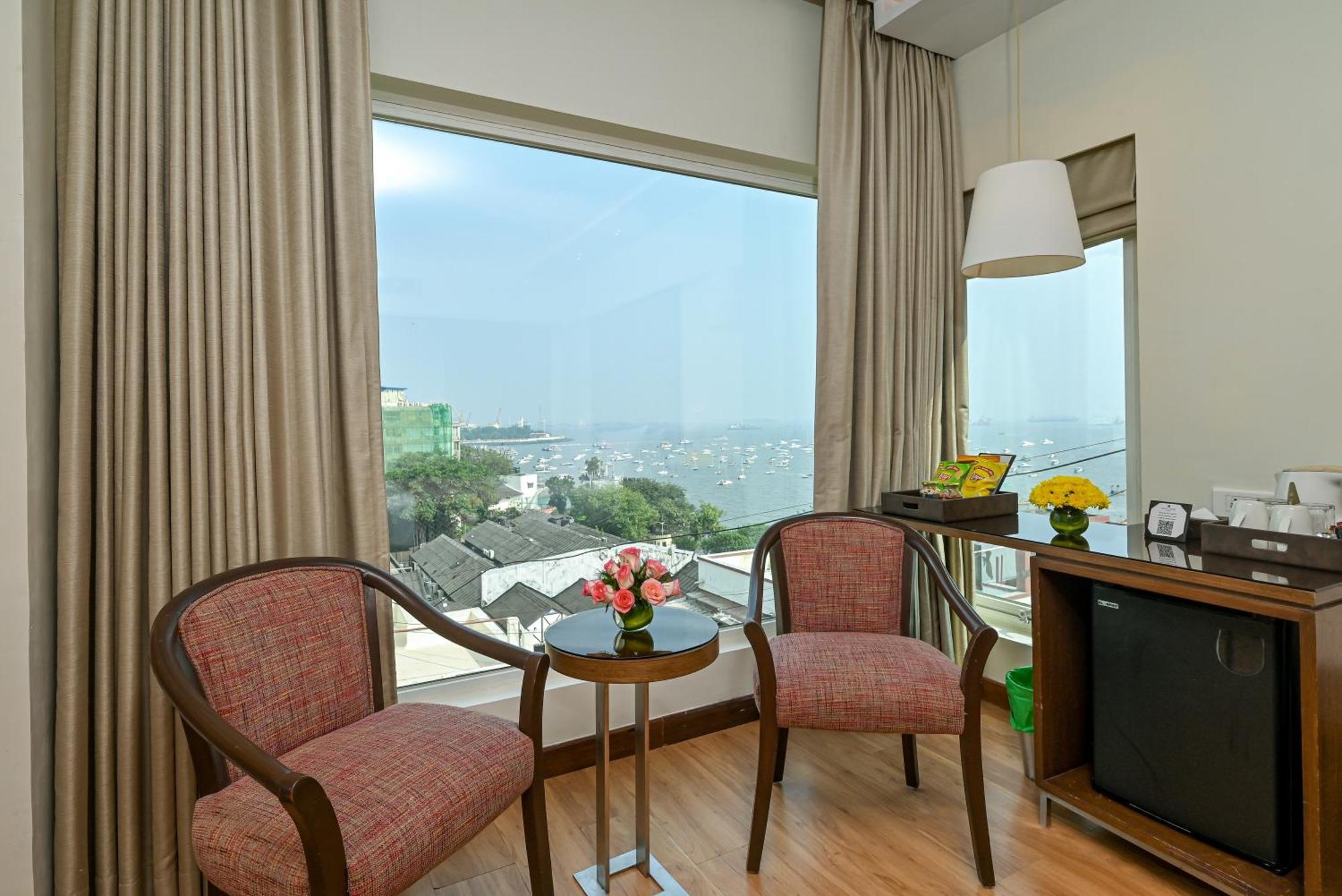 Suite Room with Mini Bar Hamper (Non-Alcoholic), Bottle of wine, chef’s choice veg or non-veg platter, 4 pieces of laundry & unlimited drinks between 18:30 and 19:30 at Tamarind Restaurant (T&C Apply)