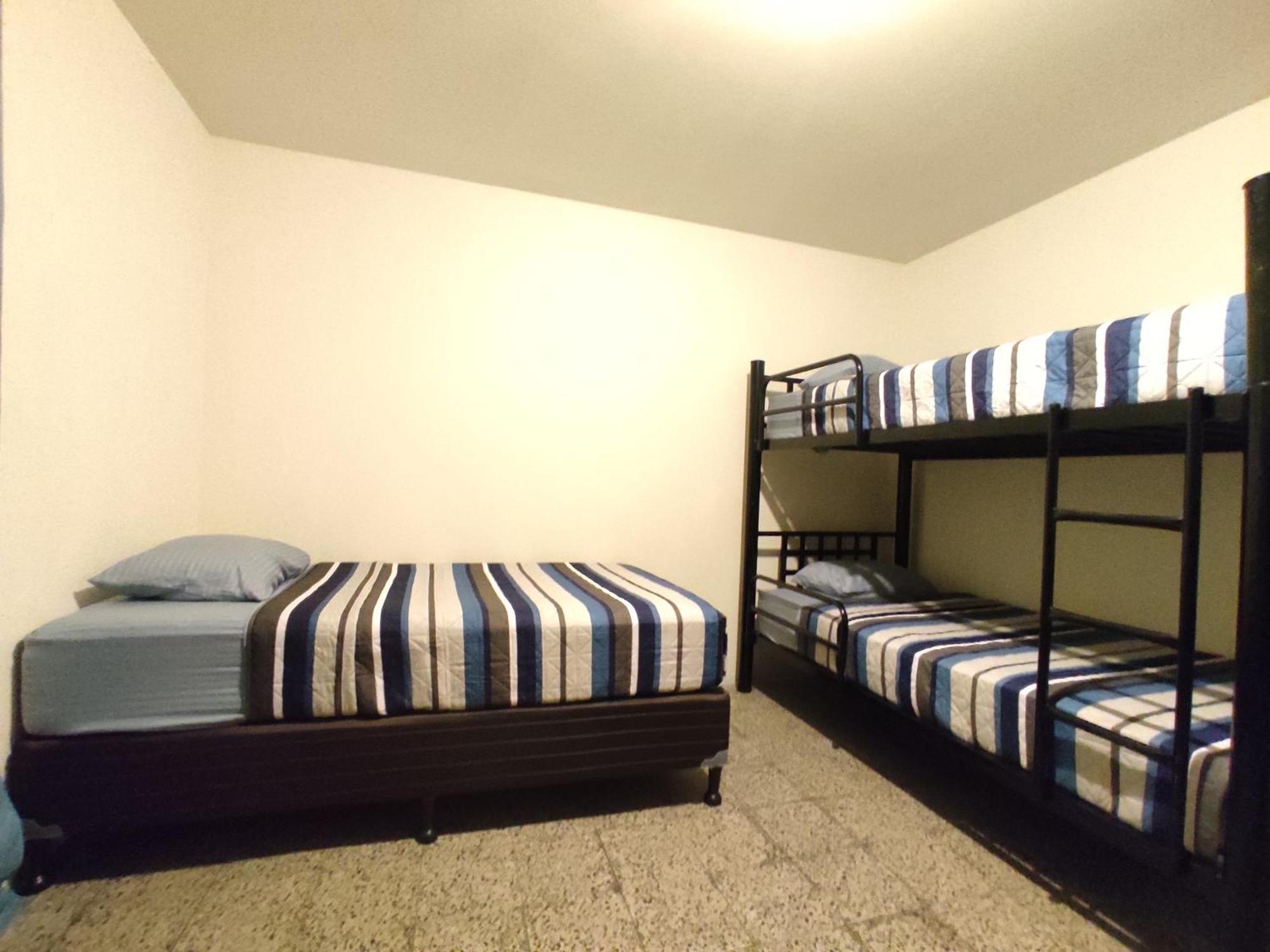 Single Bed in Dormitory Room