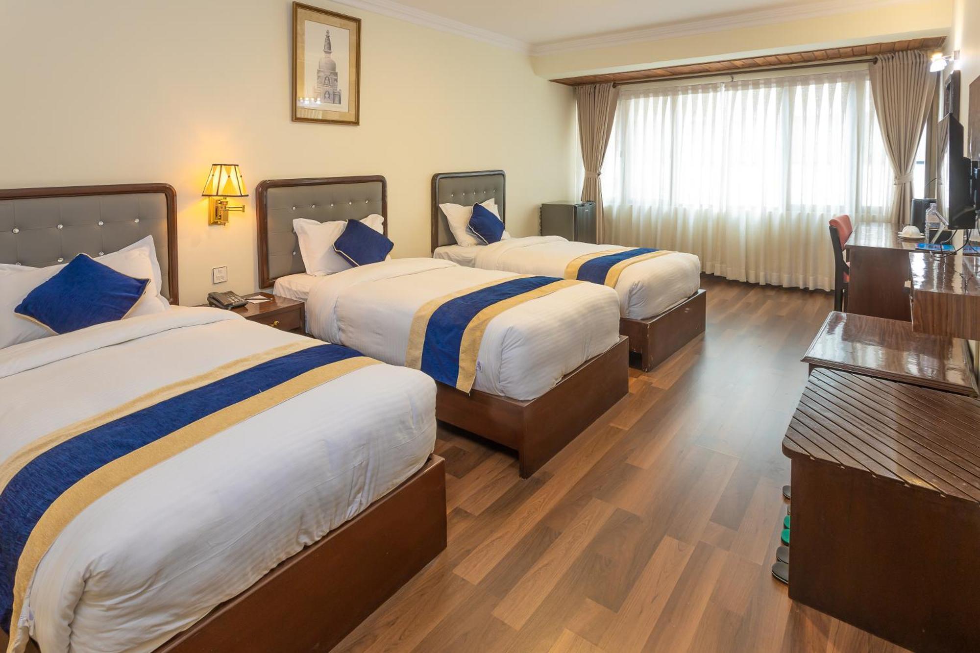Deluxe Triple Room