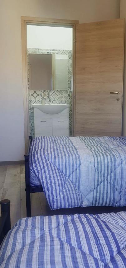 Habitación Doble con baño privado - 2 camas