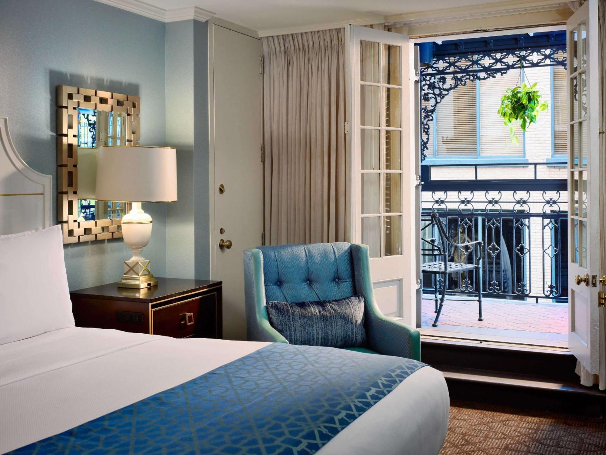 King Room with Balcony with Bourbon Street view,1609311373:JPEG