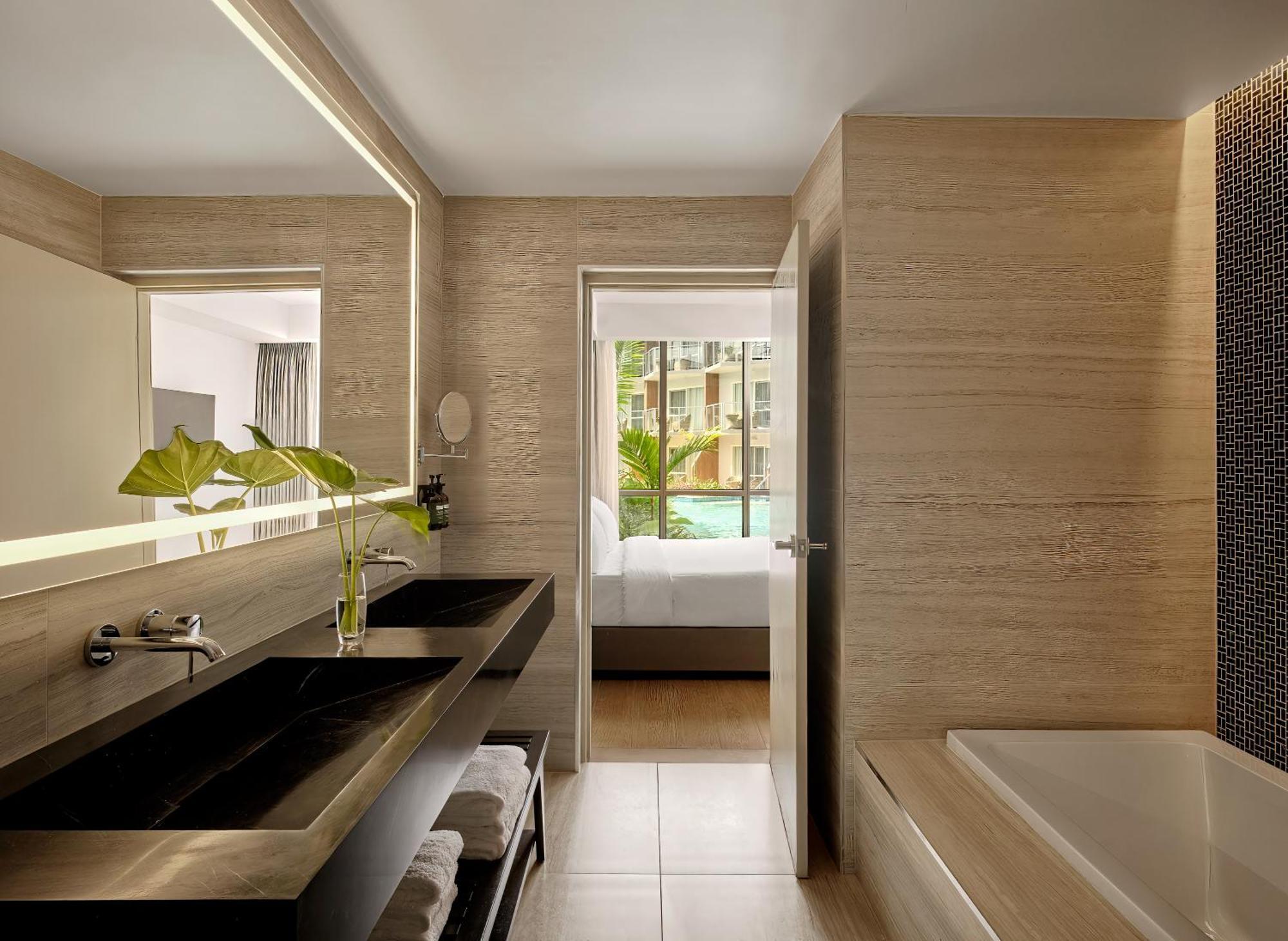 Two-Bedroom King Suite with Two Twin Beds and Garden View