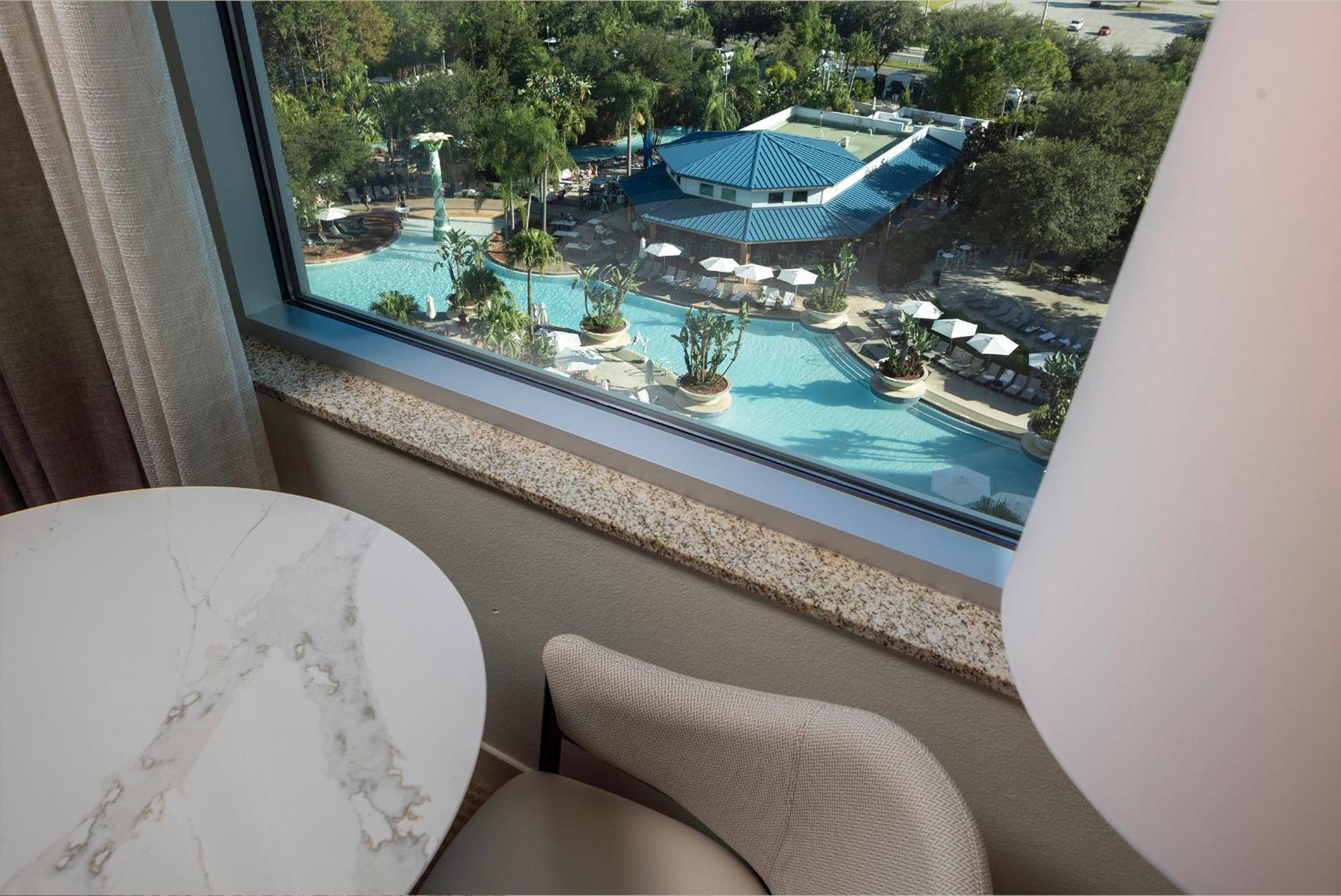 Queen Room Two Queen Beds Pool View Mobility Access or Bathtub,1742647580:JPEG