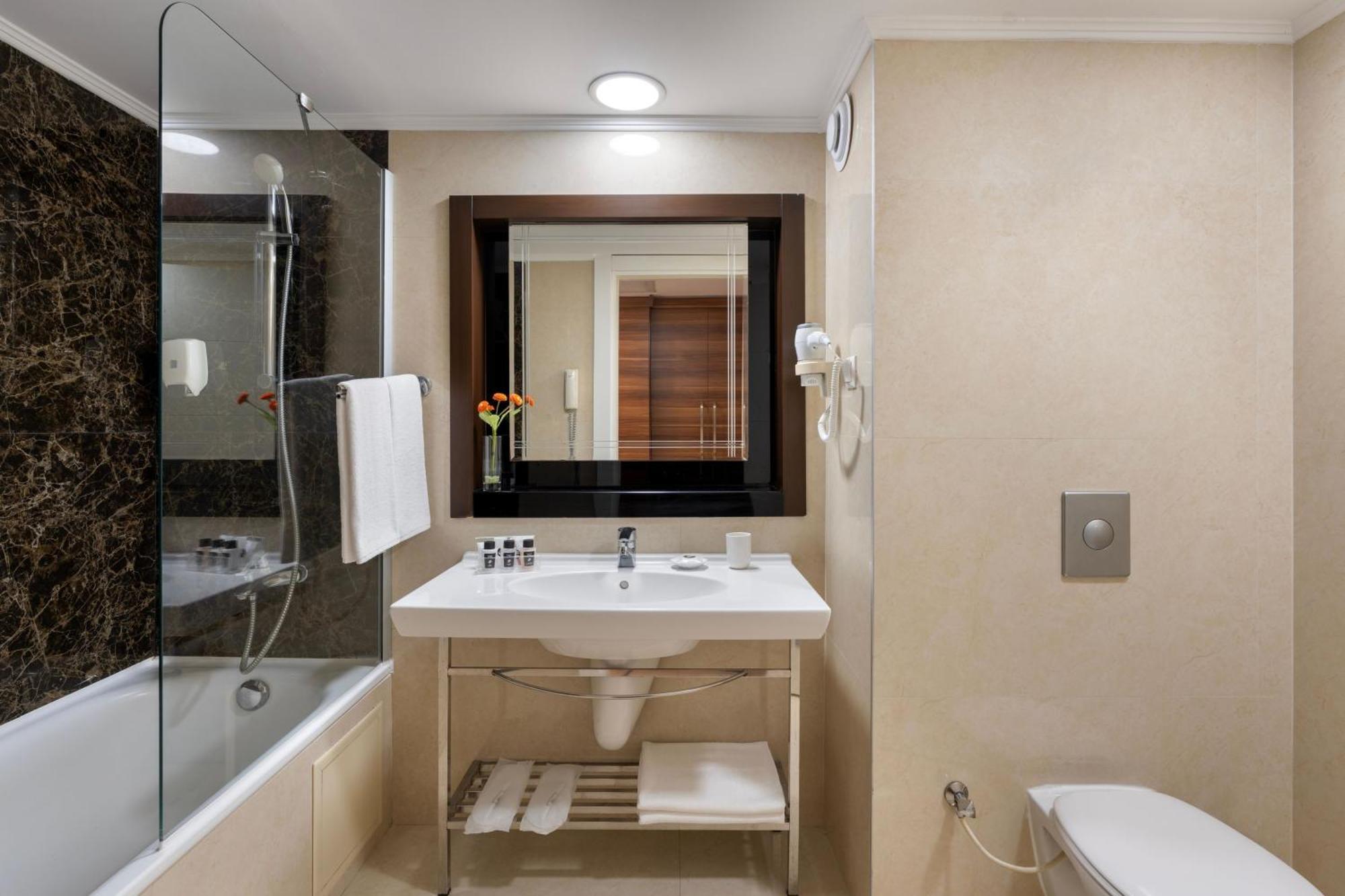 Standaard Tweepersoonskamer met 1 of 2 Bedden (2 Volwassenen + 2 Kinderen)