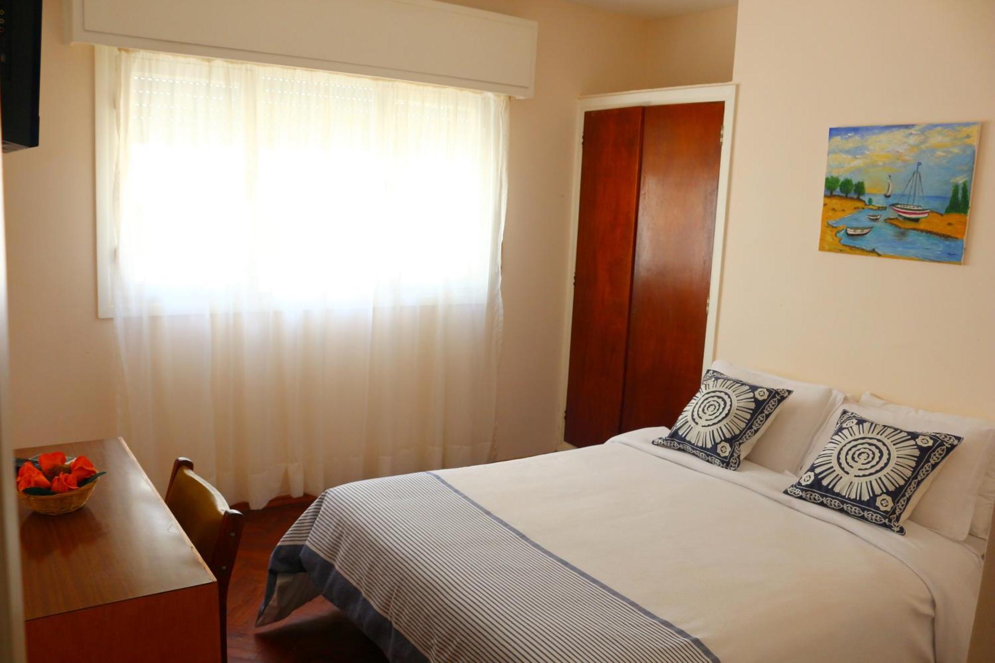 Quarto Duplo