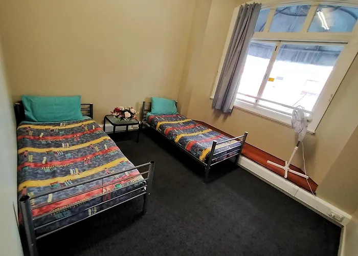 Surf 'N' Snow Backpackers Across Sky Tower