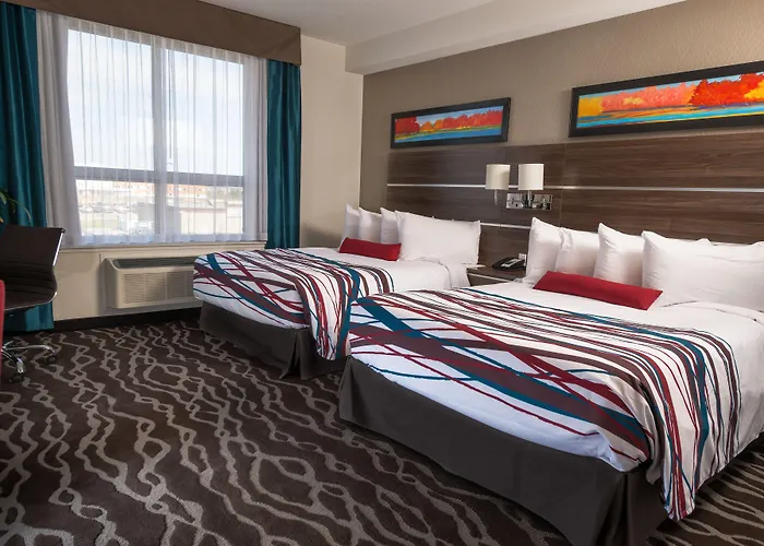 Encore Suites By Service Plus Inns